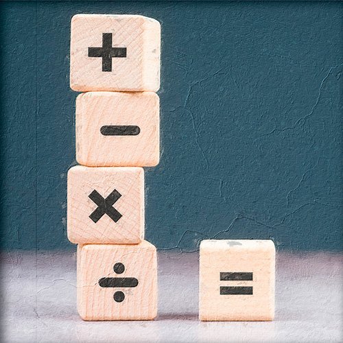 Unos bloques de madera con las operaciones matematicas